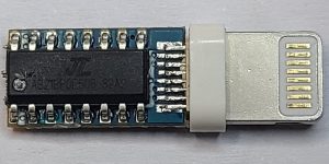 Lightning connector board populated with multiple integrated circuits