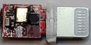 Counterfeit Lightning connector circuit board with potting compound removed