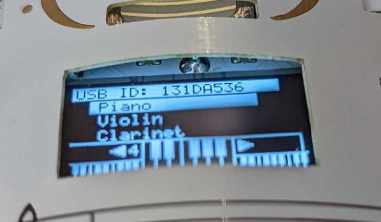 Badge LCD showing the instrument menu with the volume label removed
