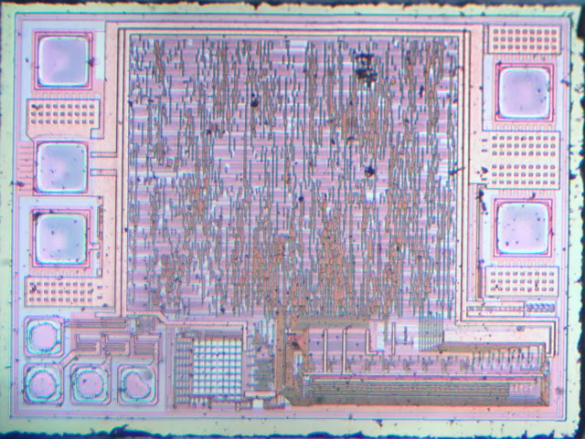 Decapsulated silicon die photographed under a microscope